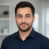 Realistic portrait of a professional Azerbaijani author with a neutral background, suitable for an editorial website profile.